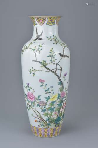 Chinese Porcelain 19th century Famille Rose Vase bearing six character mark of Qianlong in iron red,