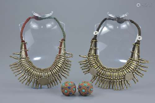 A pair of Eastern white metal tribal necklaces with half Rupee and one Rupee coins India 1810, 1922