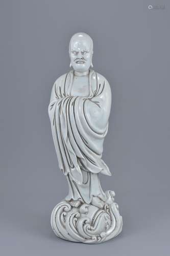 A Chinese 19/20th century Blanc de Chine figure of Damo with inscription of monastery name to revers