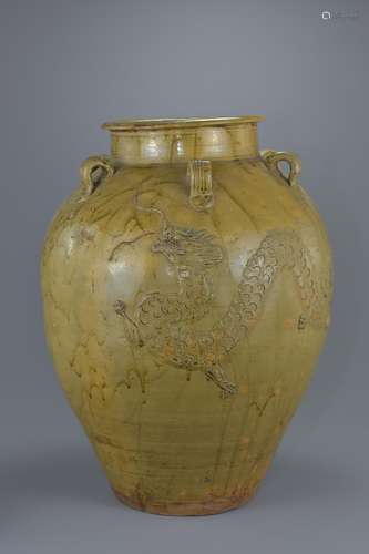 Large Chinese Qing Dynasty Martaban Dragon Jar. Decorated with two dragons in relief and coated in a