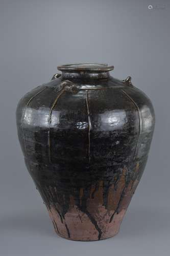 A large Chinese Song Dynasty Glazed Martaban Jar (Ex. Sotheby's). The jar is made from a reddish sto