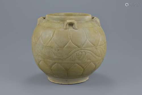 A Chinese 6th dynasty celadon glazed jar with six looped handles. 21cm tall x 22cm wide