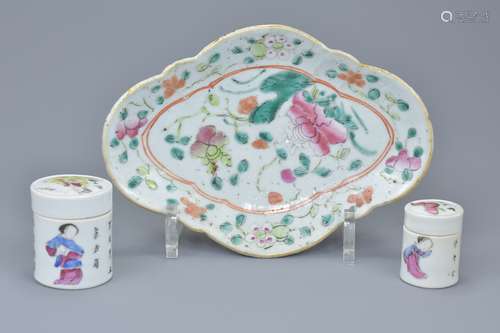 A Chinese late 19th century porcelain dish together with two Famille rose porcelain pots and covers.