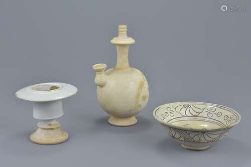 A group of three Chinese Song dynasty white glazed pottery items. To include a water bottle, an oil