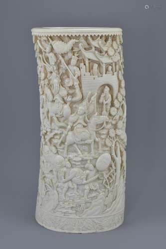 A quality large Chinese late Qing dynasty / Republic period ivory vase deeply carved with figures in