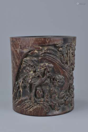 An 18th / 19th century Chinese hardwood Brush Pot superbly carved with scholar figures and inscripti