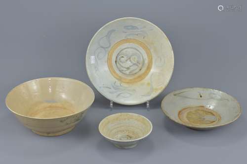 A group of four Chinese Ming and later provincial blue and white porcelain bowls and dishes. 13cm to