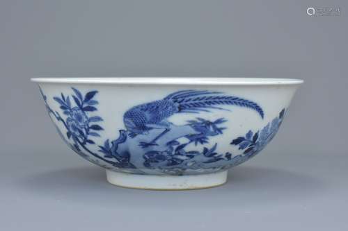 A Chinese 18th century blue and white porcelain bowl decorated with pheasant bearing six character m