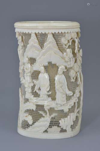 A Chinese late Qing dynasty / Republic period carved ivory vase. Carved with fine open relief scene