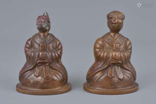 Two Chinese Early 20th century Bronze Models of a Horse and a Monkey dressed in court Style Costumes