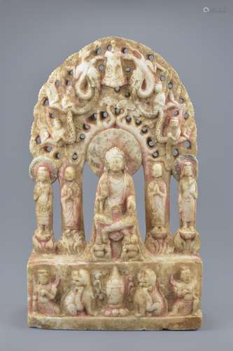 A Chinese Tang dynasty or later painted white marble Buddhist shrine carving with central seated Bud