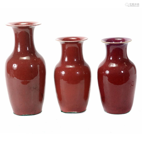 Three Chinese Ox Blood Glaze Baluster Vases.