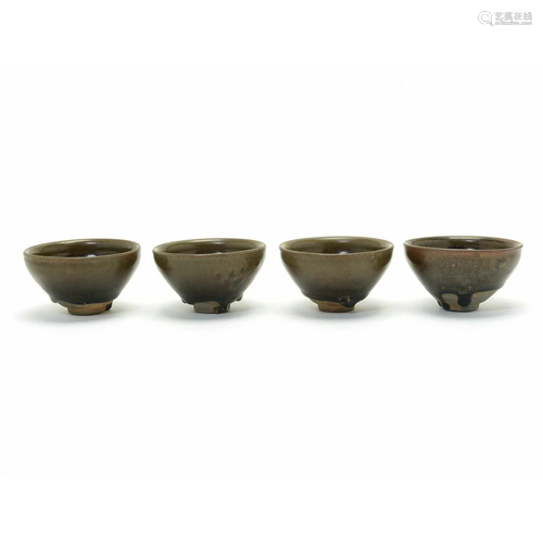 Four Chinese Brown Glazed Tea Bowls