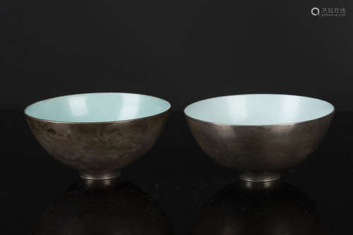 PAIR OF SILVER ENCLOSED PORCELAIN CUPS