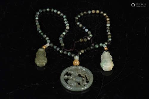 JADEITE ROUND BEAD NECKLACE WITH CARVED PENDANT