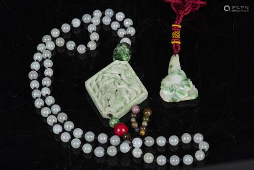 JADEITE NECKLACE WITH CARVED PENDANT