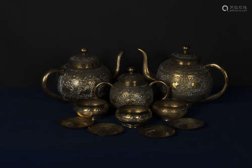 GROUP OF TEN BRONZE CAST AND CARVED DRINK WARE