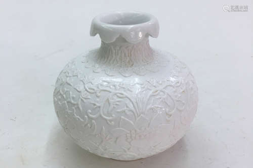VASE IN THE SHAPE OF A POMEGRANATE IN A WHITE GLAZE WITH CARVED LOTUS , QING DYNASTY, QIANLONG PERIOD
