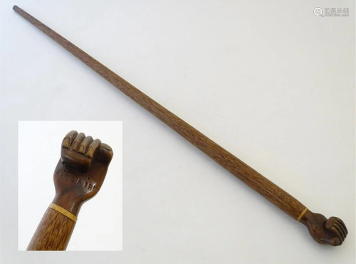 An early 20thC Pitcairn Island folk art walking stick,