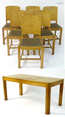 An Art Deco dining table and six matching chairs, of