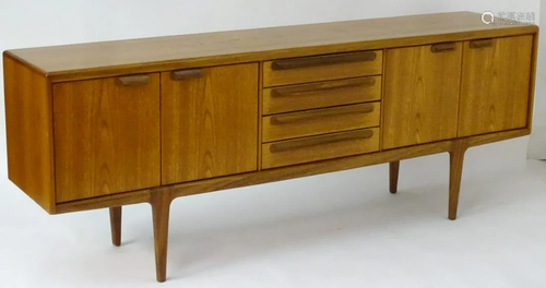 A Retro Danish teak sideboard with cupboards to…