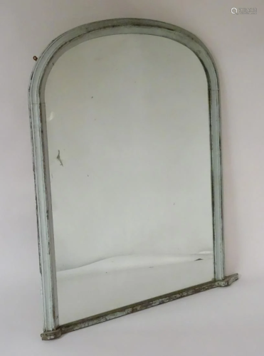 A late 19thC painted arch topped mirror. 50'' wide x