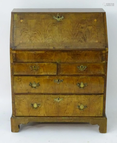 An early / mid 18thC walnut bureau with a fall front