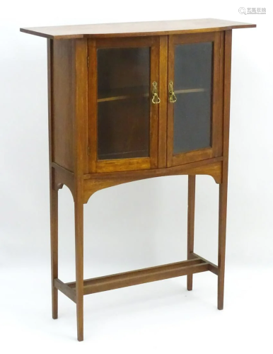 An Arts and Crafts Glasgow school cabinet with …