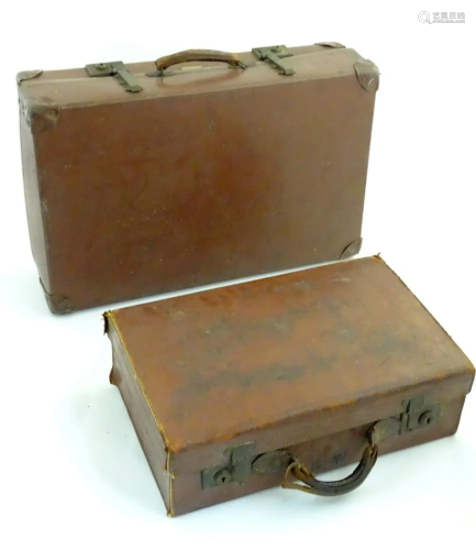 Two mid 20thC suitcases, the larger of vinyl