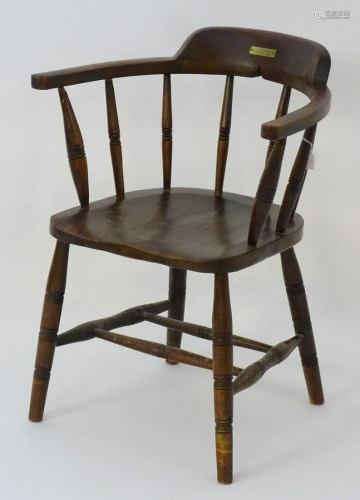 A late 19thC smokers bow chair with ring turned