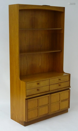 A mid / late 20thC teak wallboard dresser unit by