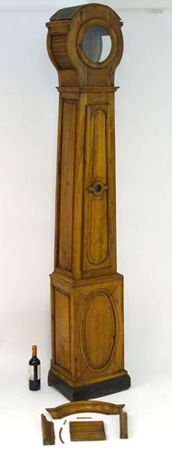 A continental 19thC cherry wood longcase clock …