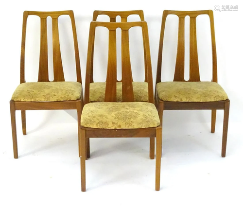 Vintage Retro: A set of four teak dining chairs with