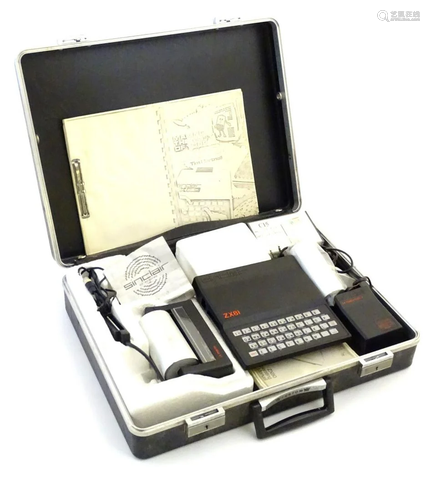 A cased Sinclair ZX81 computer, together with power