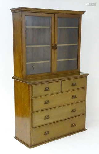 An early 20thC mahogany bookcase with a …