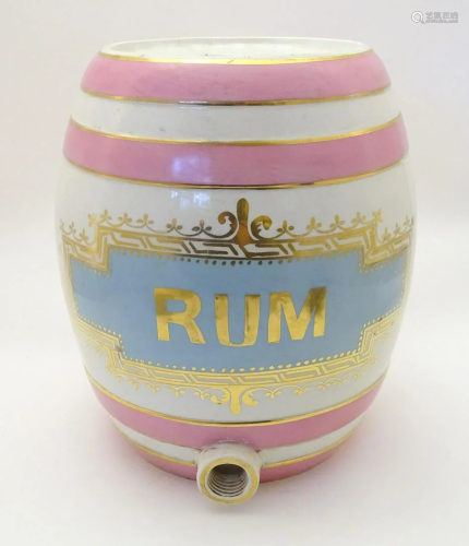 A large ceramic early 20thC public house rum barre…