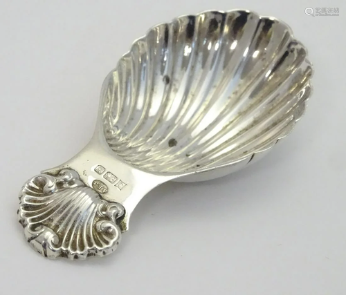 A silver caddy spoon with shell formed bowl hallm…