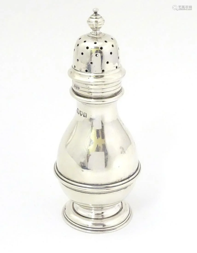 A silver sugar shaker / caster / muffineer hallmarked