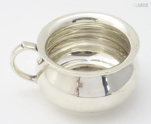 A silver punch cup hallmarked London 1938 maker