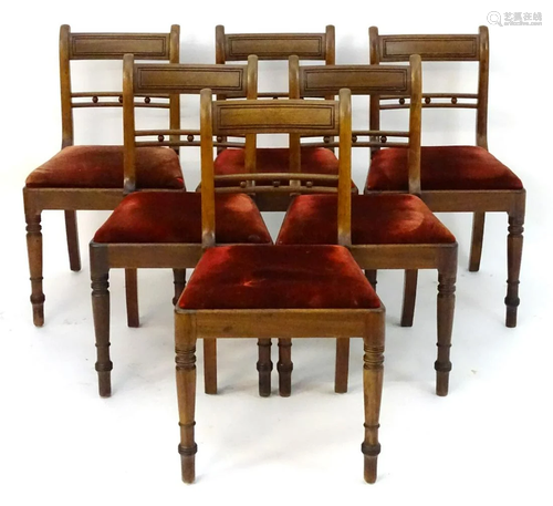 A set of six mahogany dining chairs with incised top