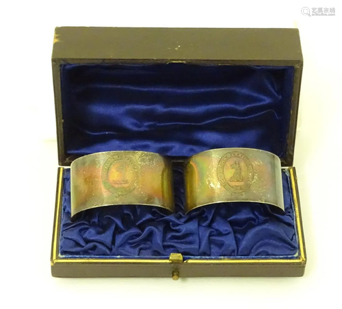 A pair of Victorian silver napkin rings hallmarked