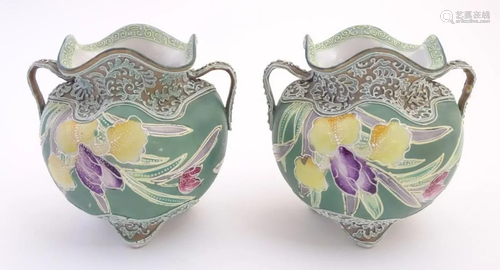 A pair of Continental twin handled vases of squat …