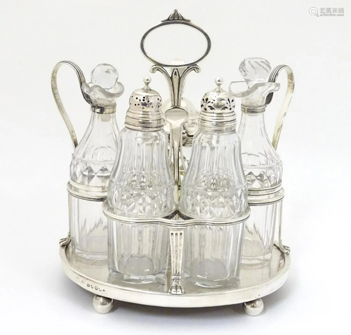 A Geo III silver cruet stand hallmarked London 1806