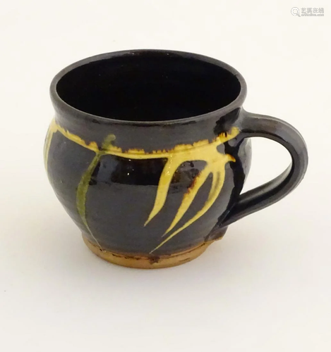 A studio pottery oversized mug, with brushwork