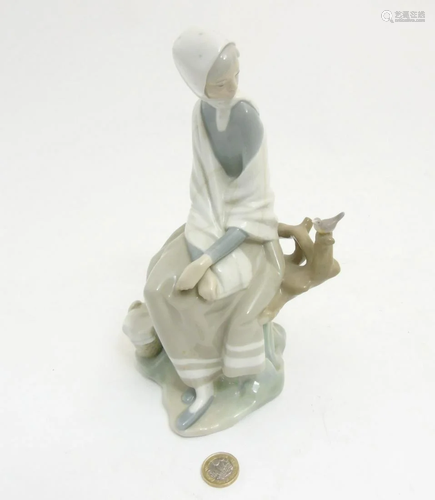 A Lladro 'New Shepherdess' figurine of a gi…