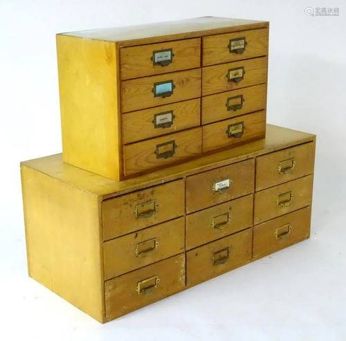 Two pine banks of drawers, one containing six …