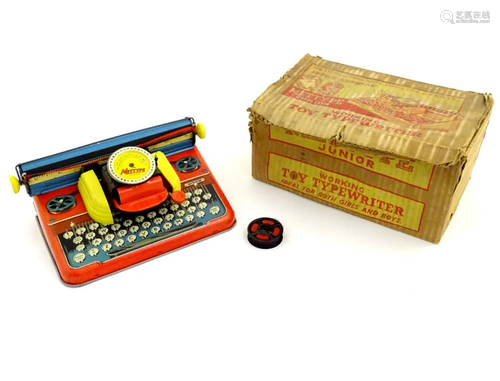 Toy: A 20thC Mettype Junior tinplate toy typewriter,