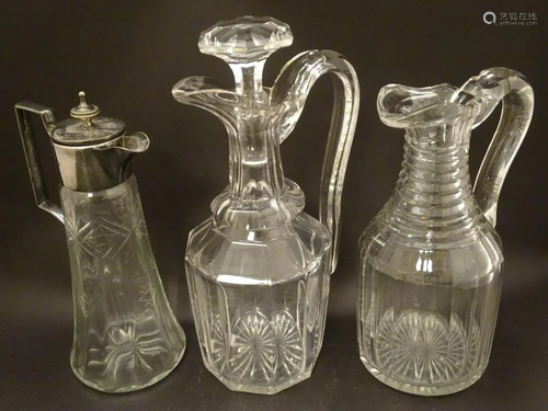 Three assorted 19thC glass claret jugs, one with s…