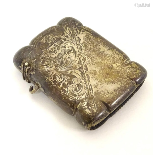 A silver vesta case with engraved decoration hallmarked