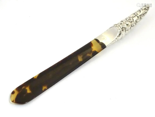 A silver handled tortoiseshell letter opener / p…